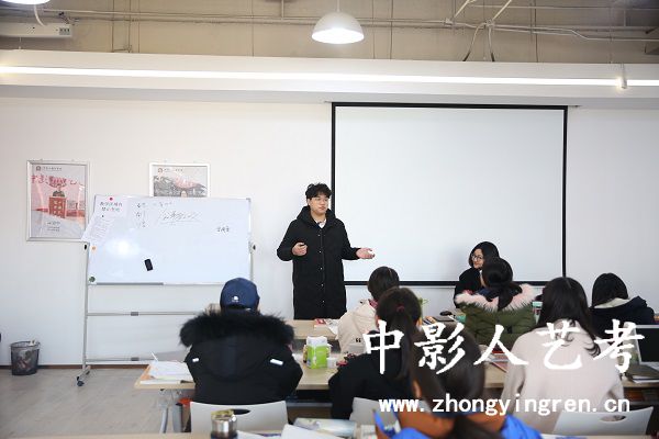 �������b